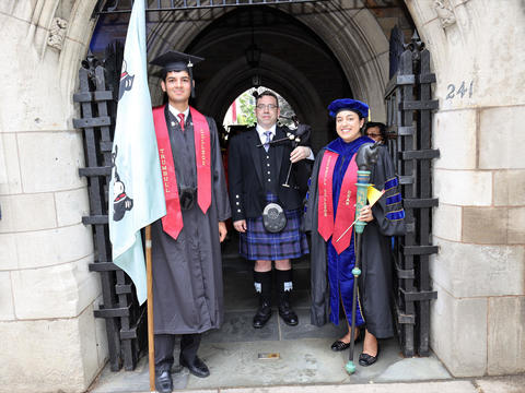 graduate with man in kilt and college dean