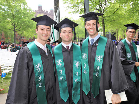 graduates posing for photo